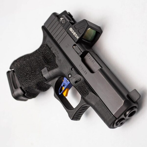Top right view of Gideon Optics Rock red dot sight mounted to a Glock G26