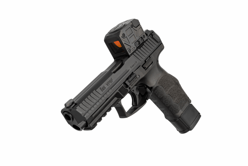 Mediator II enclosed emitter red dot mounted on a VP9F