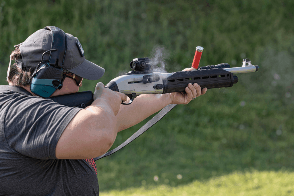 advocate eye relief - Gideon Optics Man firing a gun with a Gideon Optics Advocate prism sight mounted