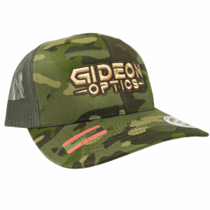 Front view of Gideon Optics branded Multicam green snapback
