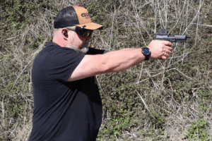 Mike from Gideon Optics shooting a pistol with a Mediator XL mounted