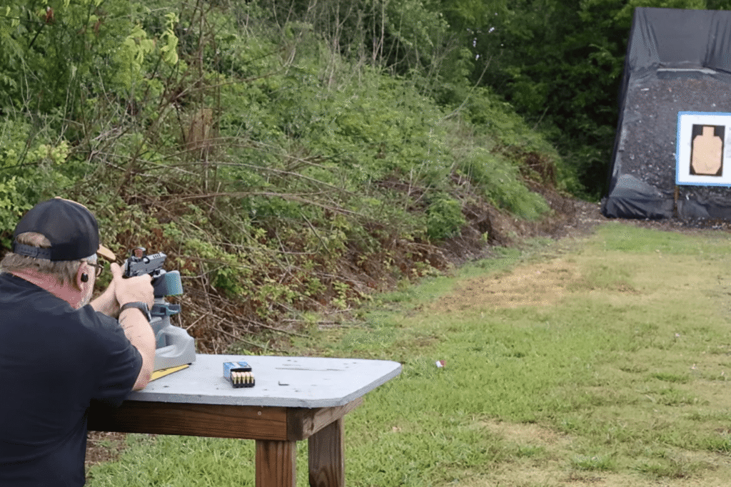 Mike from Gideon Optics at an outdoor shooting range demonstrating how to zero a red dot sight