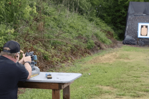 Mike from Gideon Optics at an outdoor shooting range demonstrating how to zero a red dot sight