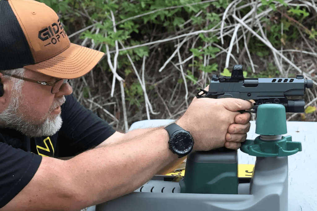 image - Gideon Optics Mike from Gideon Optics at an outdoor range zeroing his pistol optic